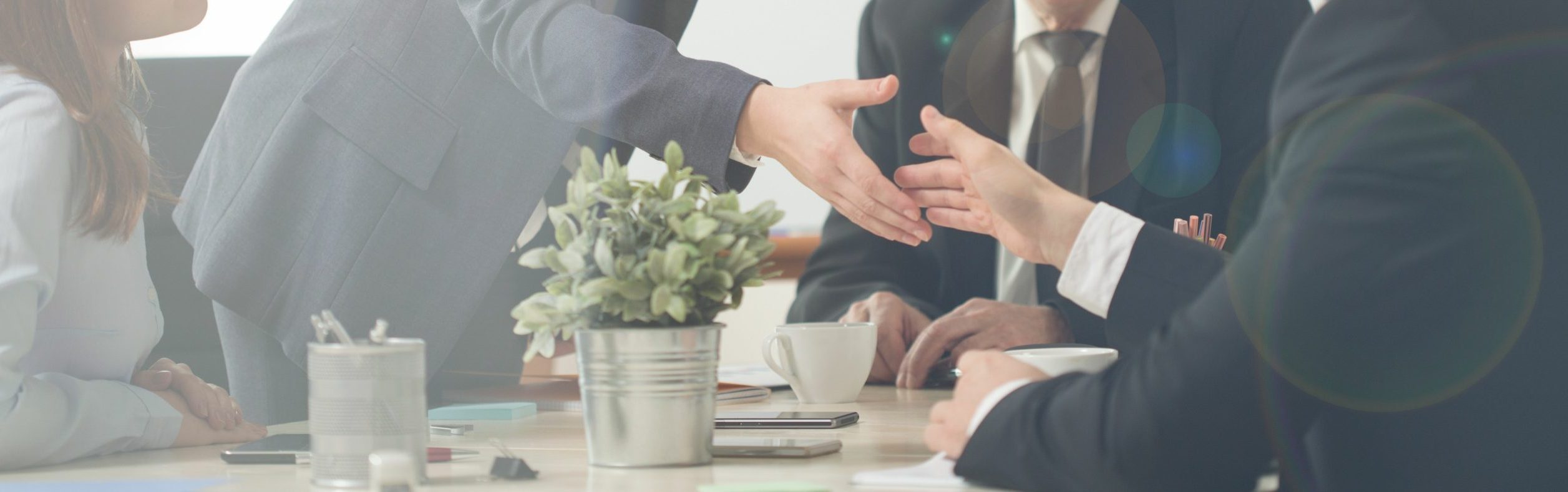 Panorama of handshake on a business meeting